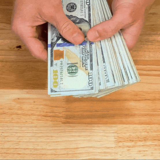 Prop money RealAged $100 bills spread