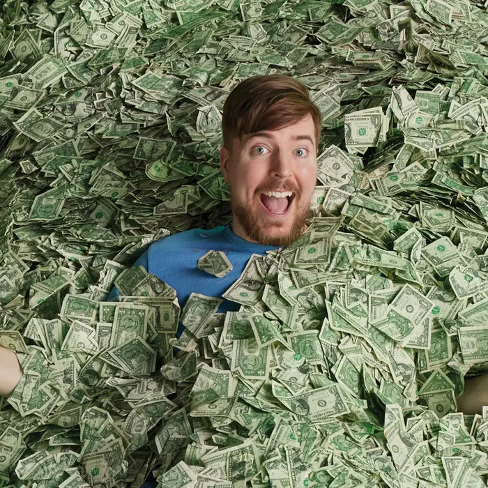 MrBeast surrounded by massive stacks of realistic prop money used for viral YouTube production visuals and entertainment content.