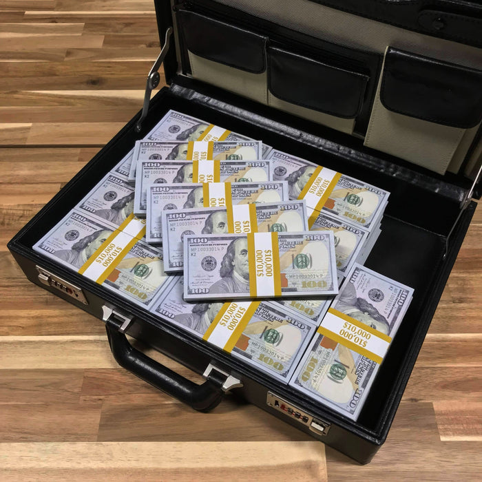 Open black briefcase holding banded Full Print $100 prop money stacks
