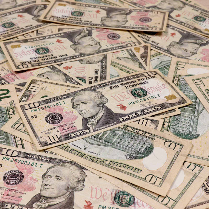 Realistic aged $10 prop money bills for film and photography