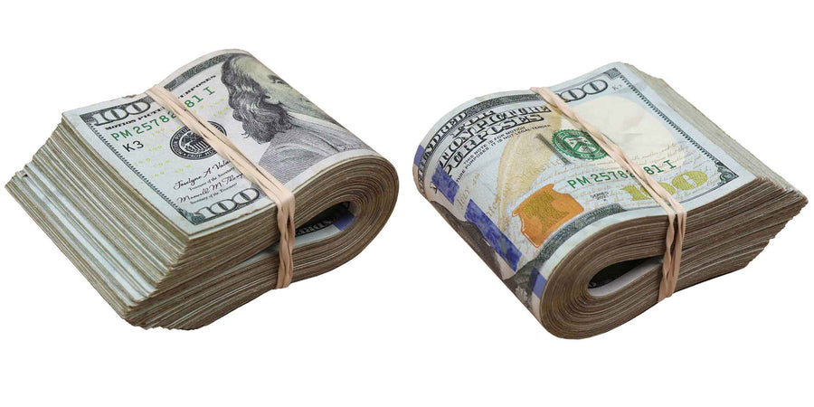 RealAged band of folded prop money