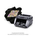 AI-generated kit illustration: Black duffel bag filled with Full Print $20, $50, and $100 prop money stacks beside a money counter; see additional photos for actual product details