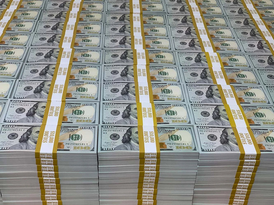 Actual yellow-banded Full Print $100 prop money stacks arranged together